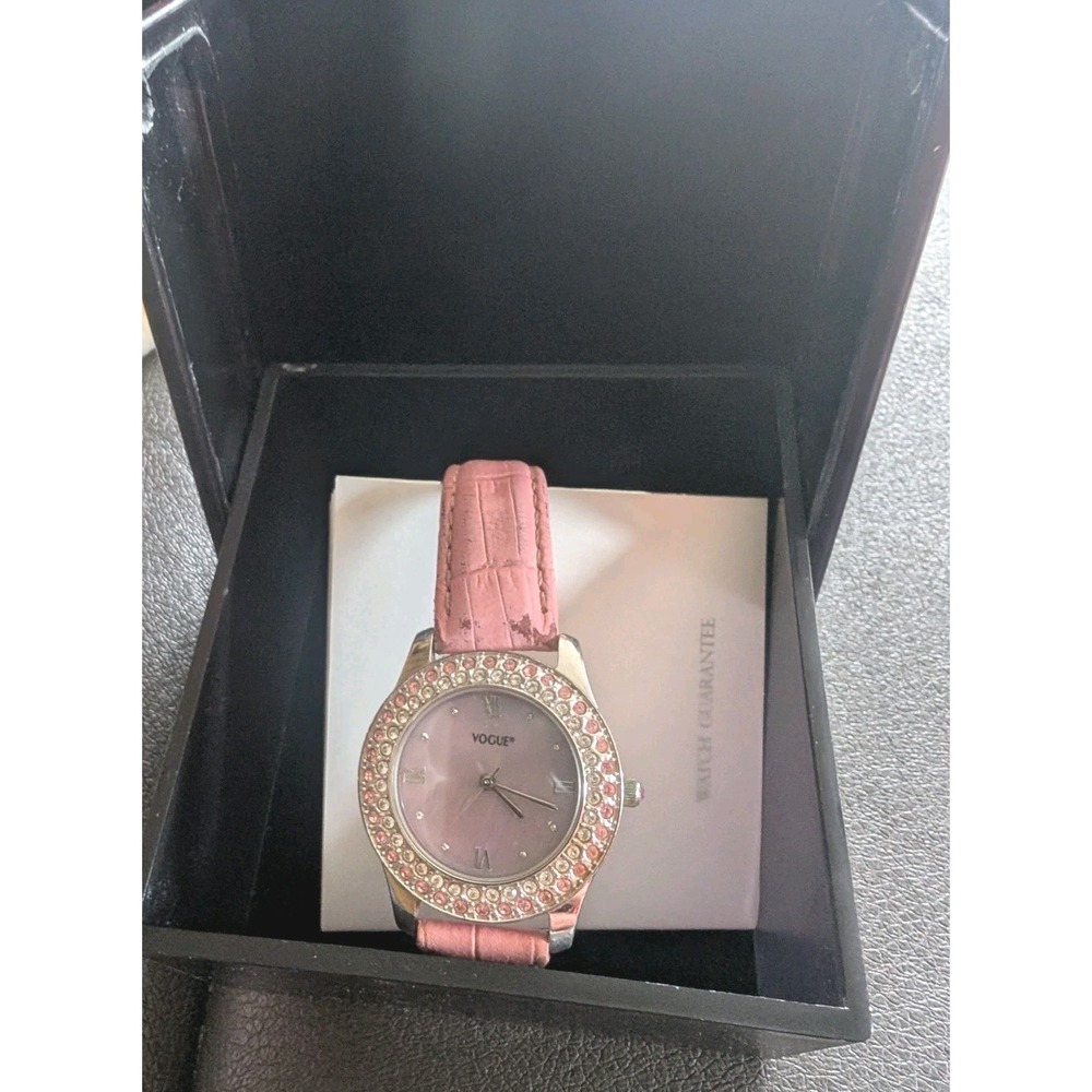 Vogue womens Pink quartz Watch Authentic With Case And Pamphlet.